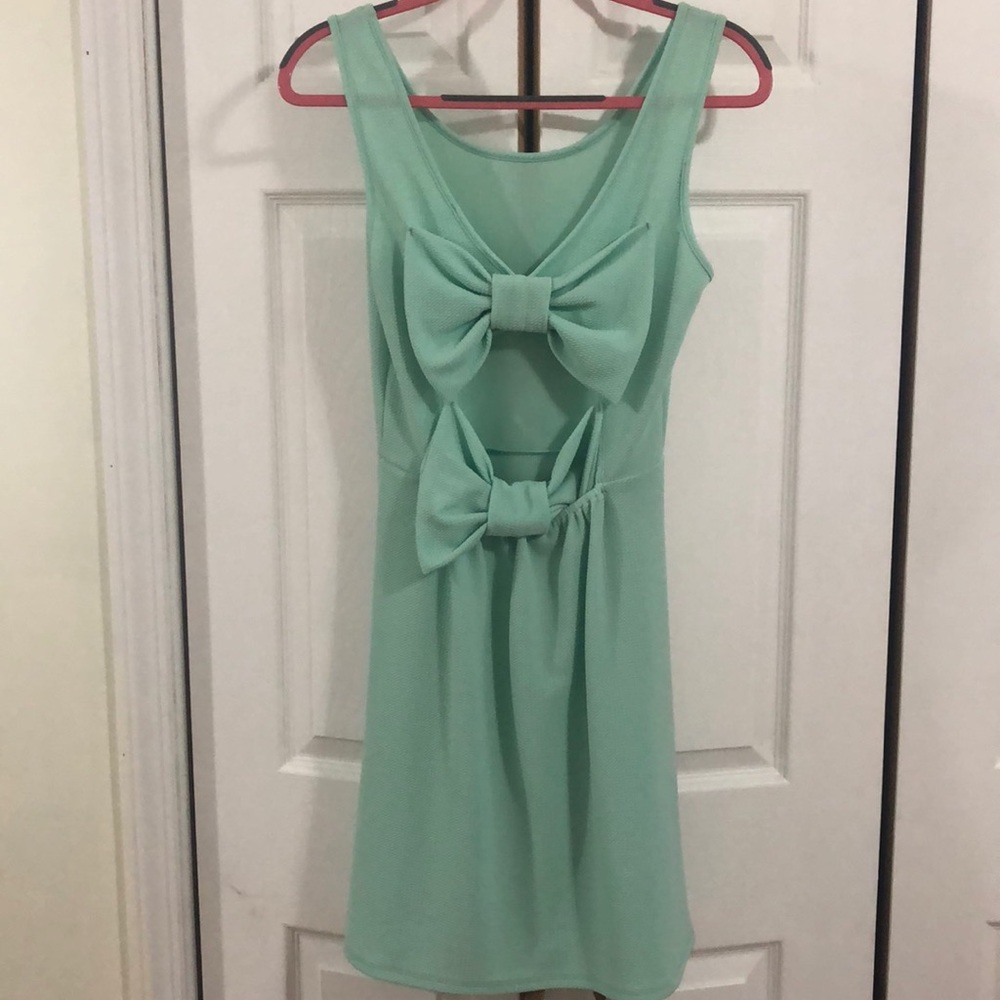 Bowed back teal dress